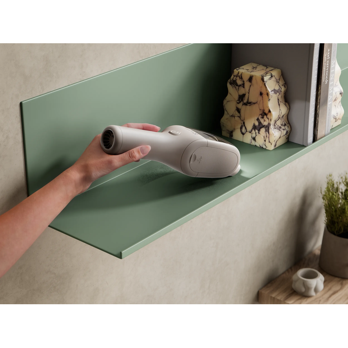 Product vacuuming fine dust on a shelf