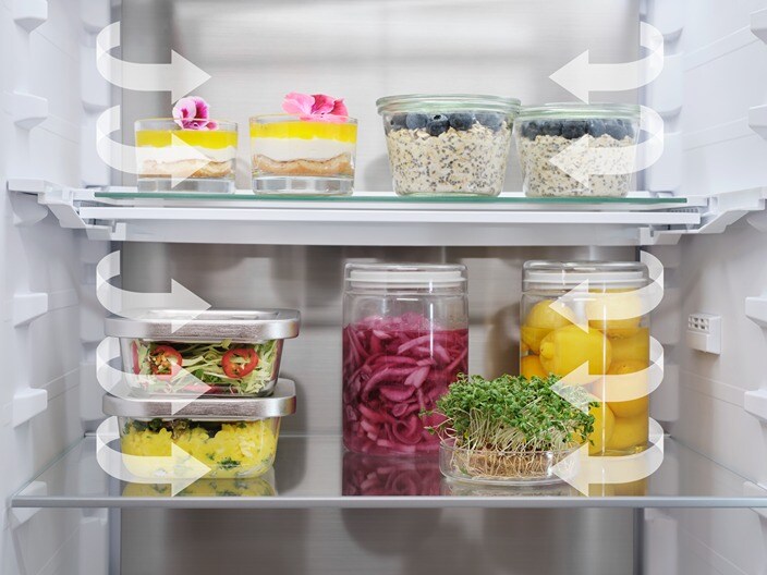 Different types of food are placed in a fridge-freezer.