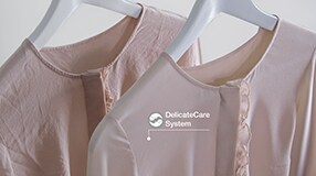 Pink shirts on hangers