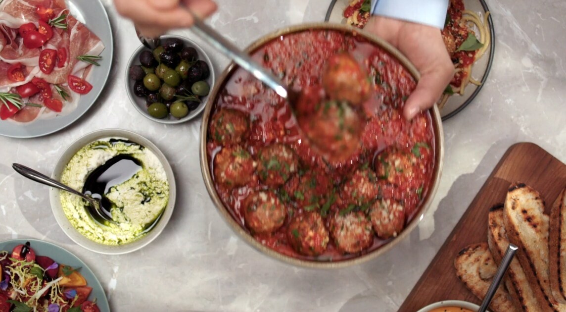 Several food dishes on a table.