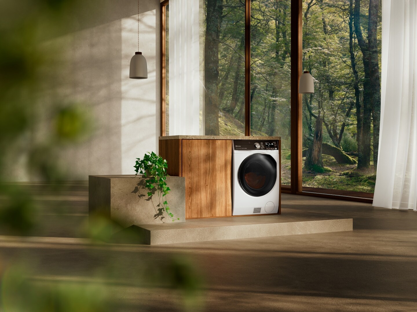 Electrolux washer dryer in an open space.